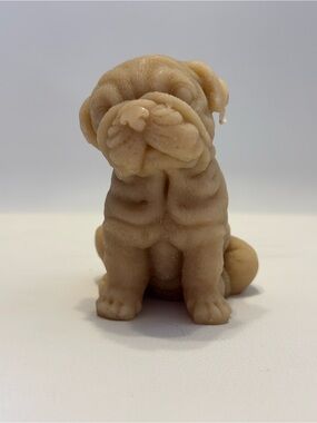 Beige Puppy Figurine candle.